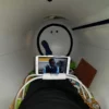 customer-with-laptop-inside-a-hyperbaric-chamber-2