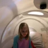 summit-to-sea-hyperbaric-chamber-interior-girl